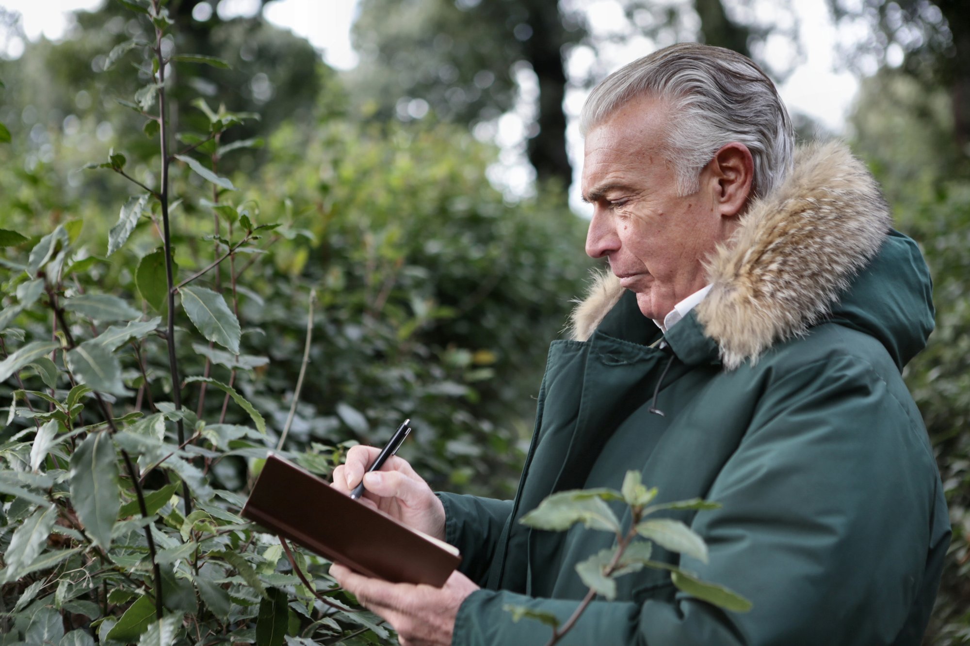 Man writing in journal